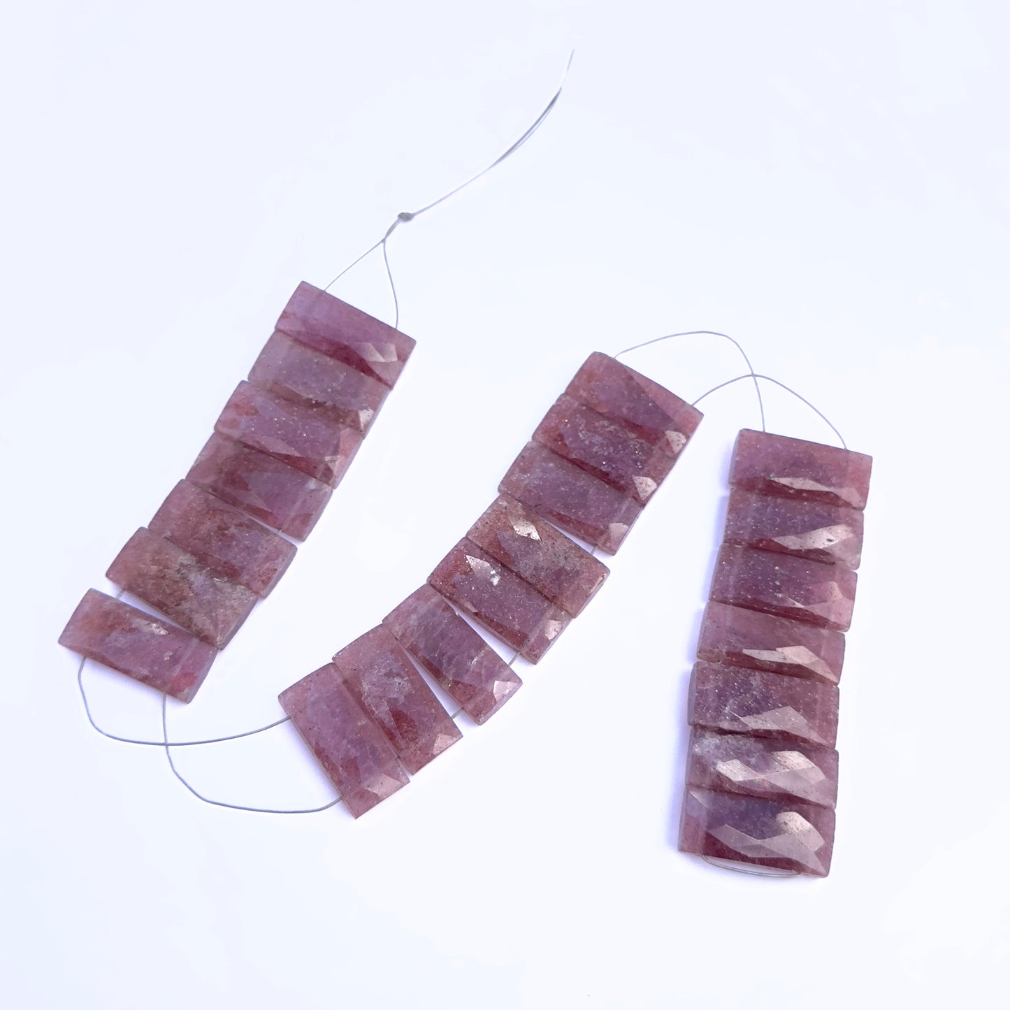 Shop Strawberry Quartz Faceted Rectangle Beads, 21x9.2–9.5mm. 22 drilled pieces ideal for handmade jewellery, stringing, and custom gemstone designs.