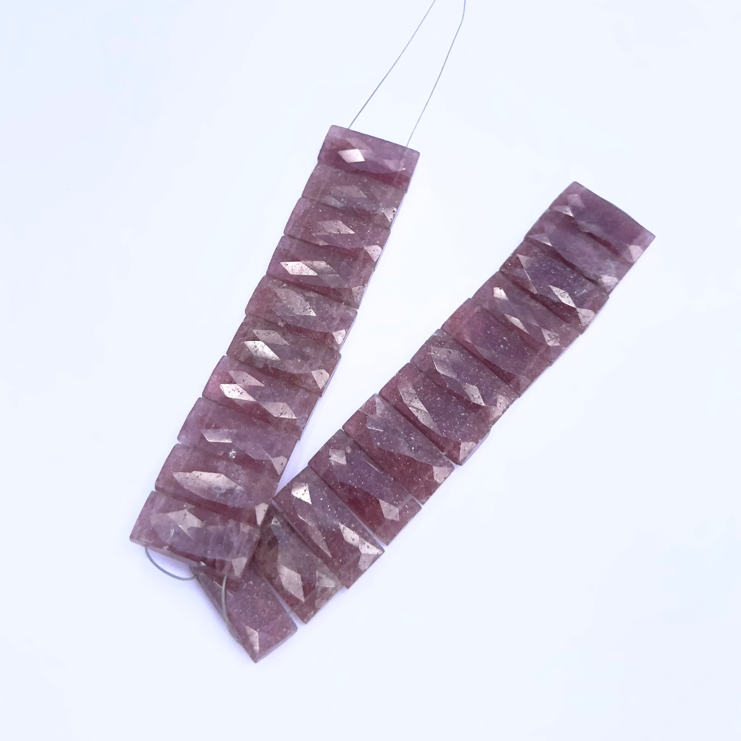 Natural gemstone beads in Strawberry Quartz rectangle cut, ideal for DIY jewellery and artisan designs.