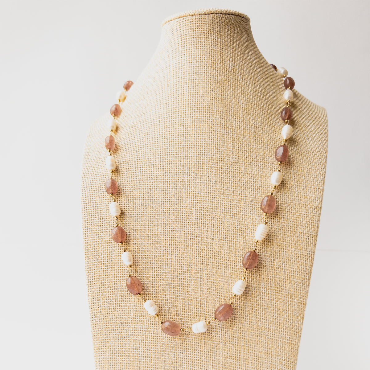 Authentic Strawberry Quartz stone beads paired with lustrous Freshwater Pearls in a sophisticated handcrafted necklace design.