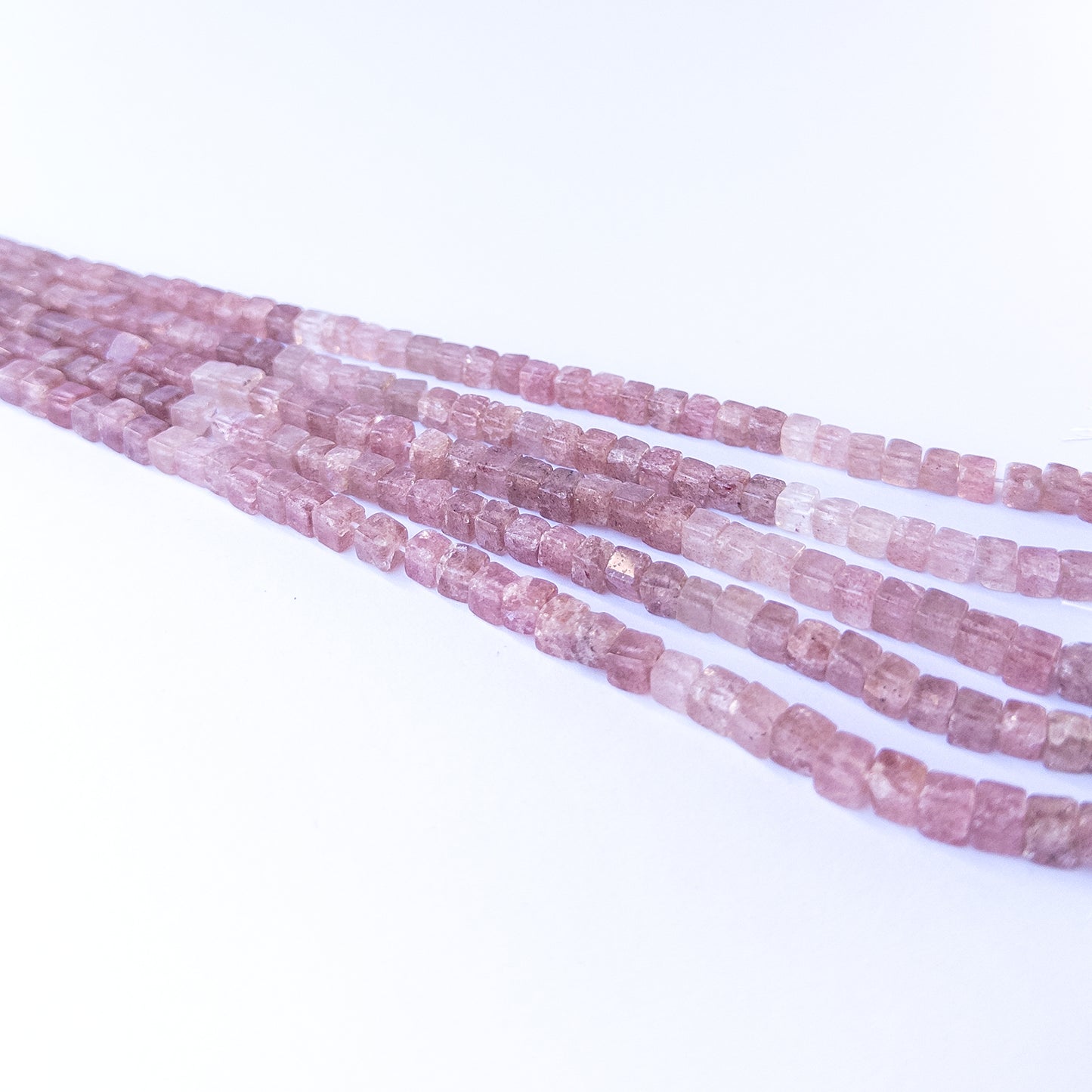 Genuine strawberry quartz stone beads with polished smooth cube shaping, ideal for DIY jewellery and artisan beadwork.