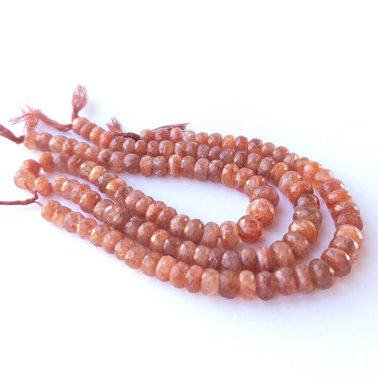 Sunstone faceted rondelle gemstone beads 7–9.5mm arranged in a shimmering 20cm strand for handmade jewellery.