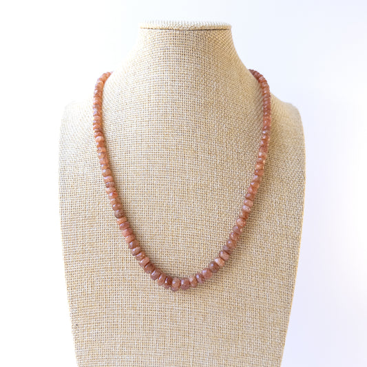 Warm glowing Sunstone faceted rondelle beads arranged in a 48cm necklace for handmade gemstone jewellery.