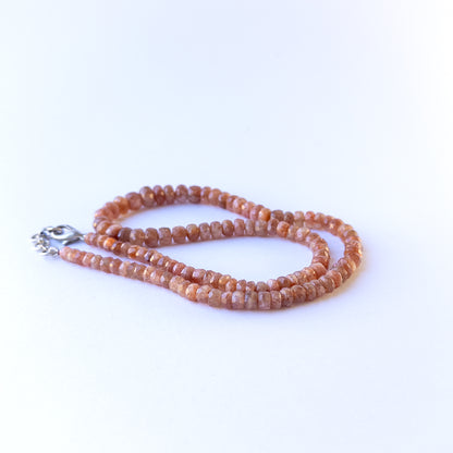 High quality Sunstone faceted rondelle beads in 6–8mm sizes, perfect for handmade jewellery components.