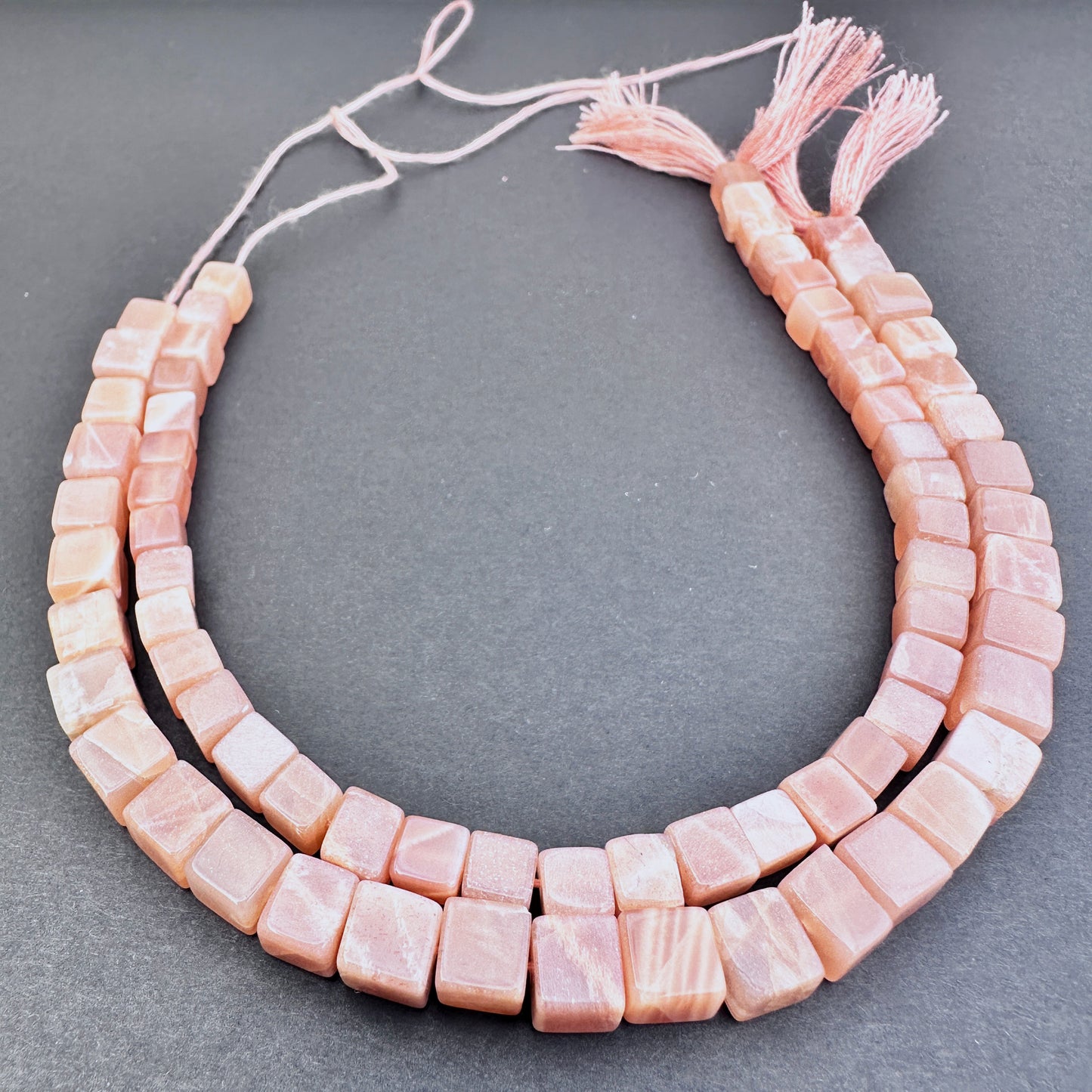 Handmade jewellery components featuring 5.5-6mm and 6.5-7mm Sunstone stone beads.