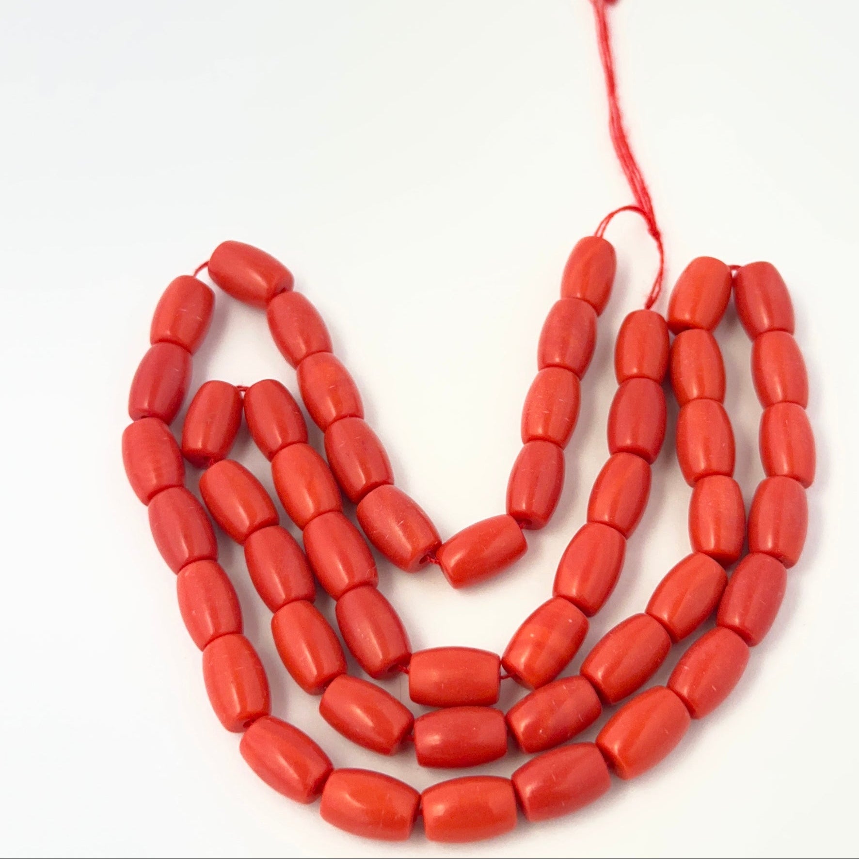 Smooth Taiwan Coral stone beads showing rich colour and handmade jewellery component quality.