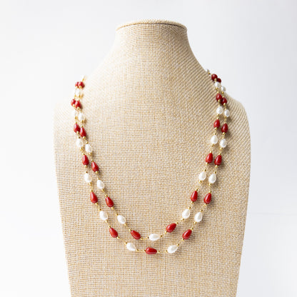 Genuine Taiwan Coral and Freshwater Pearl necklace showcasing smooth teardrop gemstones in a graceful two-strand design.
