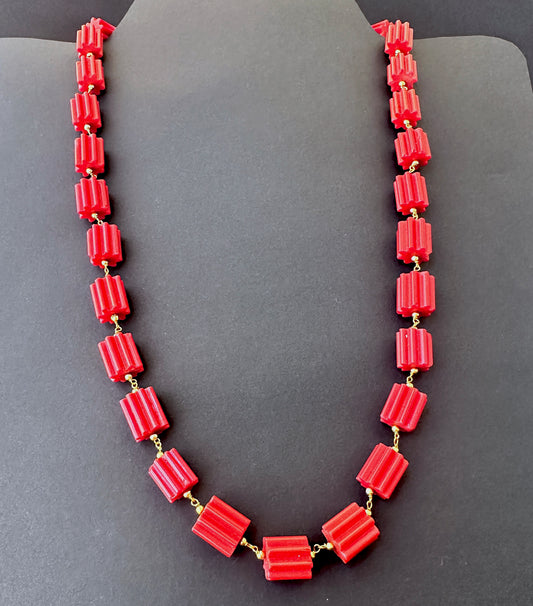 Faceted cylinder coral stone beads necklace, 12x11mm, designed for timeless elegance and versatile styling.