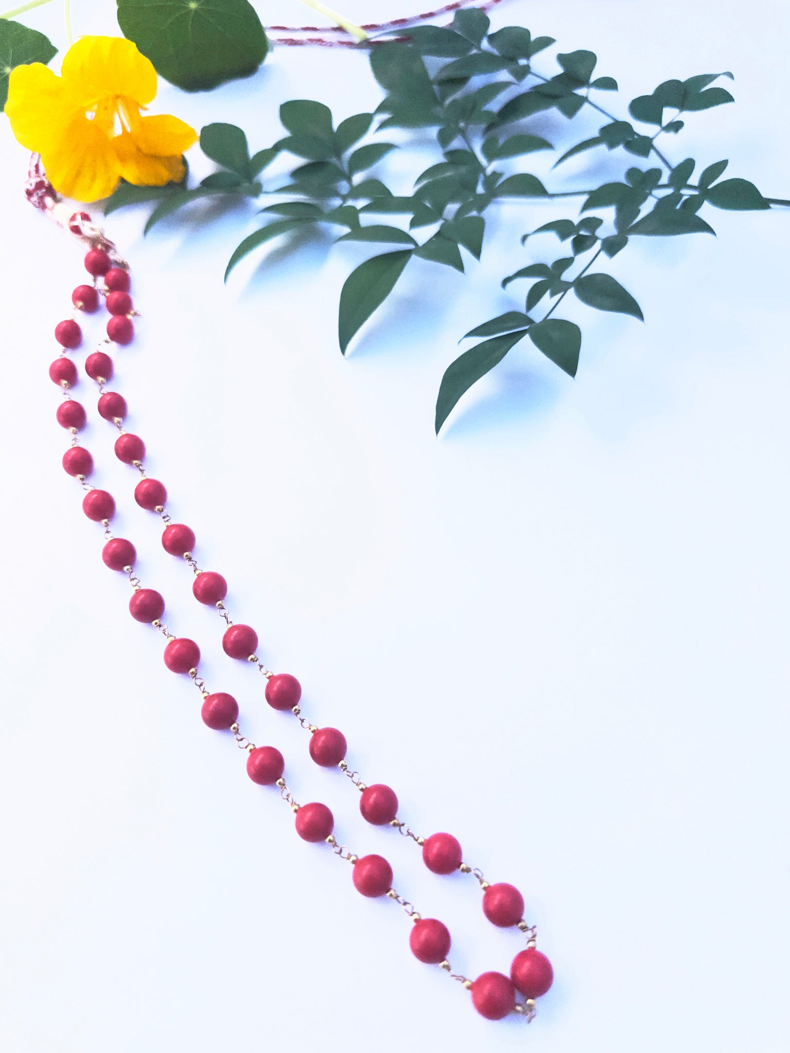  Taiwan Coral gemstone beads necklace, polished round cut, radiant shine, silk tassel detail.