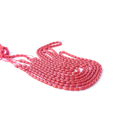 Smooth drum Taiwan Coral gemstone beads with natural shine, perfect for delicate handcrafted jewellery designs.