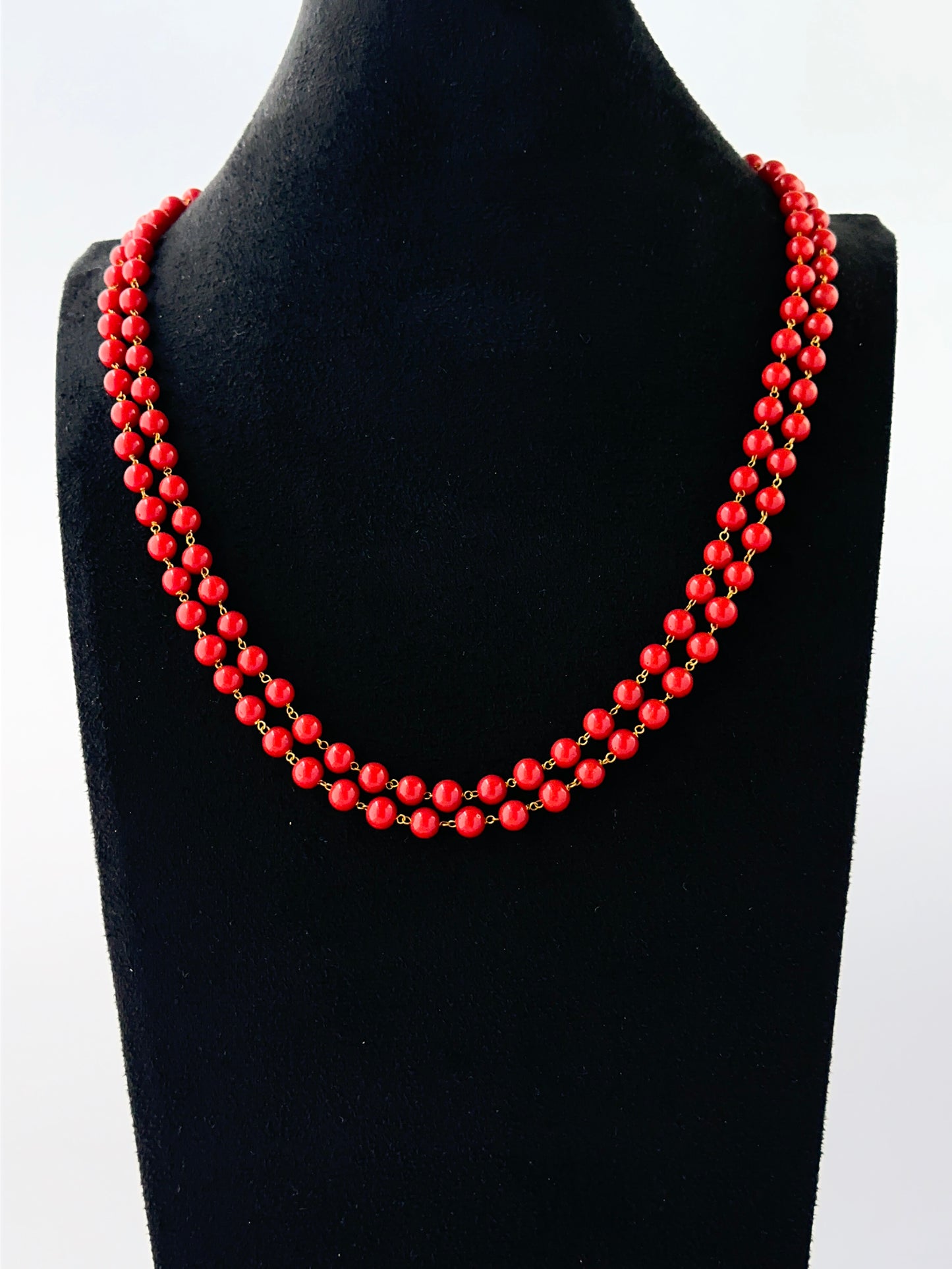 Two‑layer Taiwan coral necklace with smooth round 6mm beads and adjustable closure.