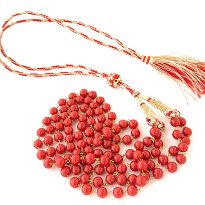Multi‑layer coral necklace featuring 6mm smooth round beads in adjustable lengths.