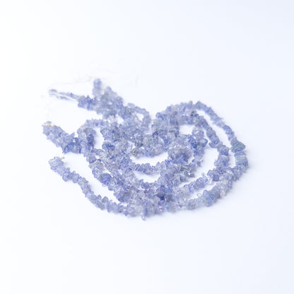 Genuine Tanzanite stone beads with organic chip shapes and shimmering colour for jewellery making.