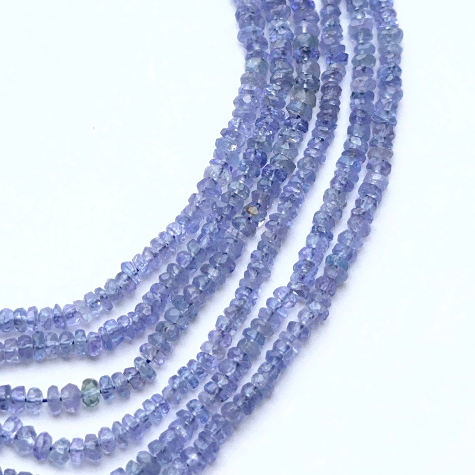 Tanzanite strand featuring sparkling rondelle beads in a delicate polished design.
