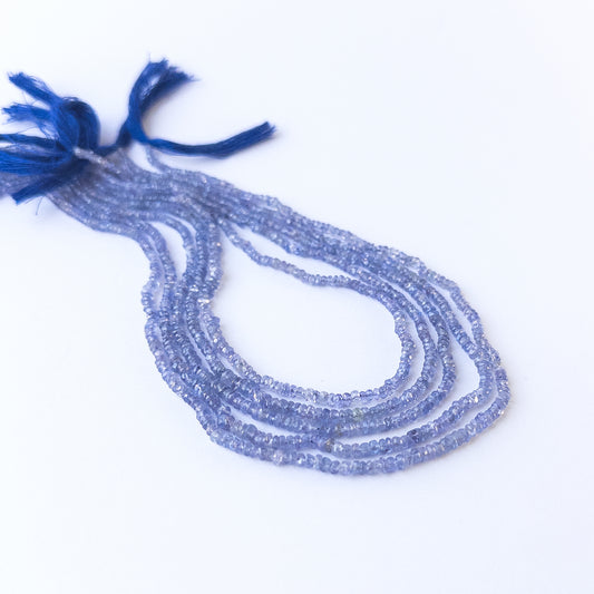 Authentic tanzanite gemstone beads showcasing vivid violet‑blue tones and fine faceting for premium jewellery.