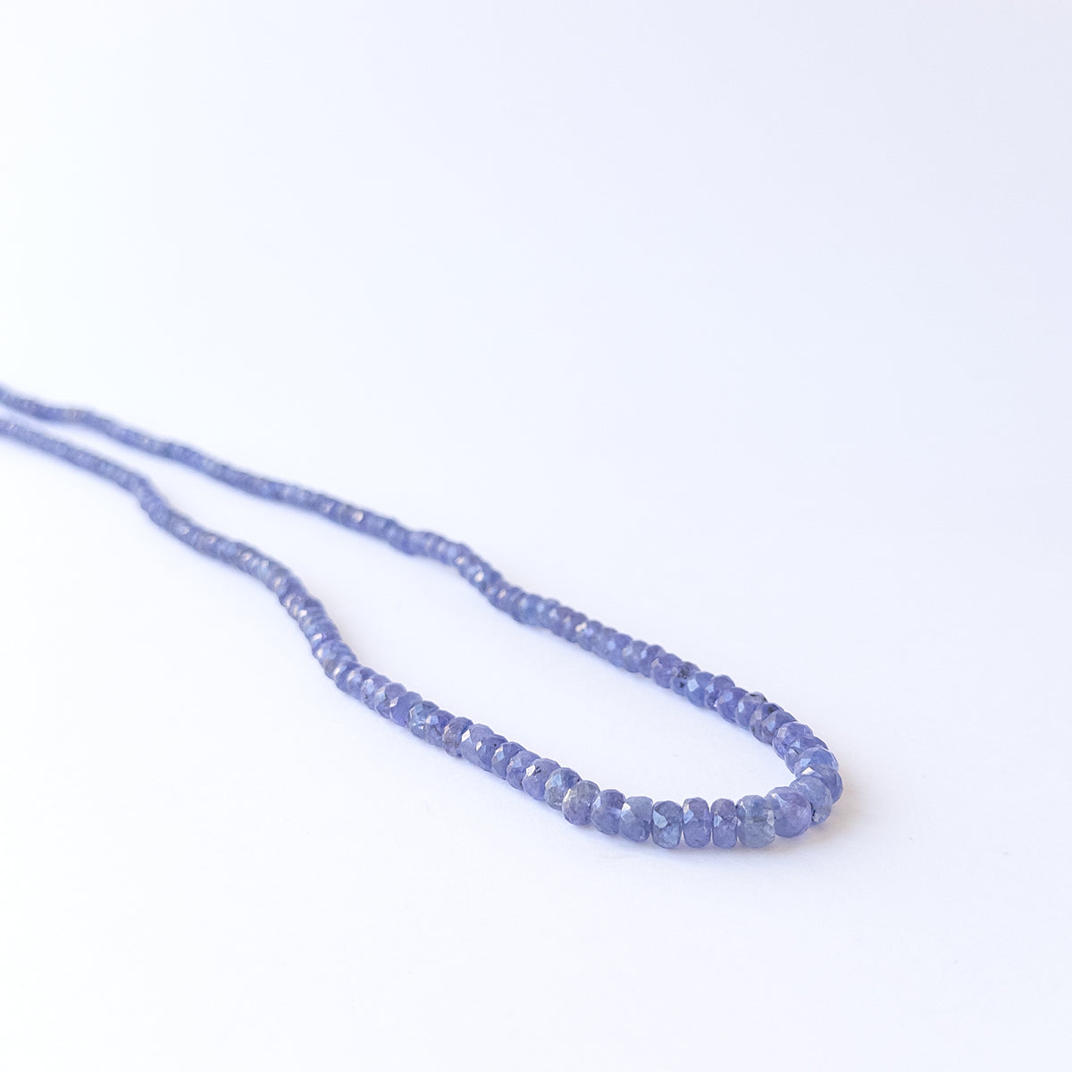 High‑quality Tanzanite gemstone beads with brilliant faceting and rich violet‑blue tones.