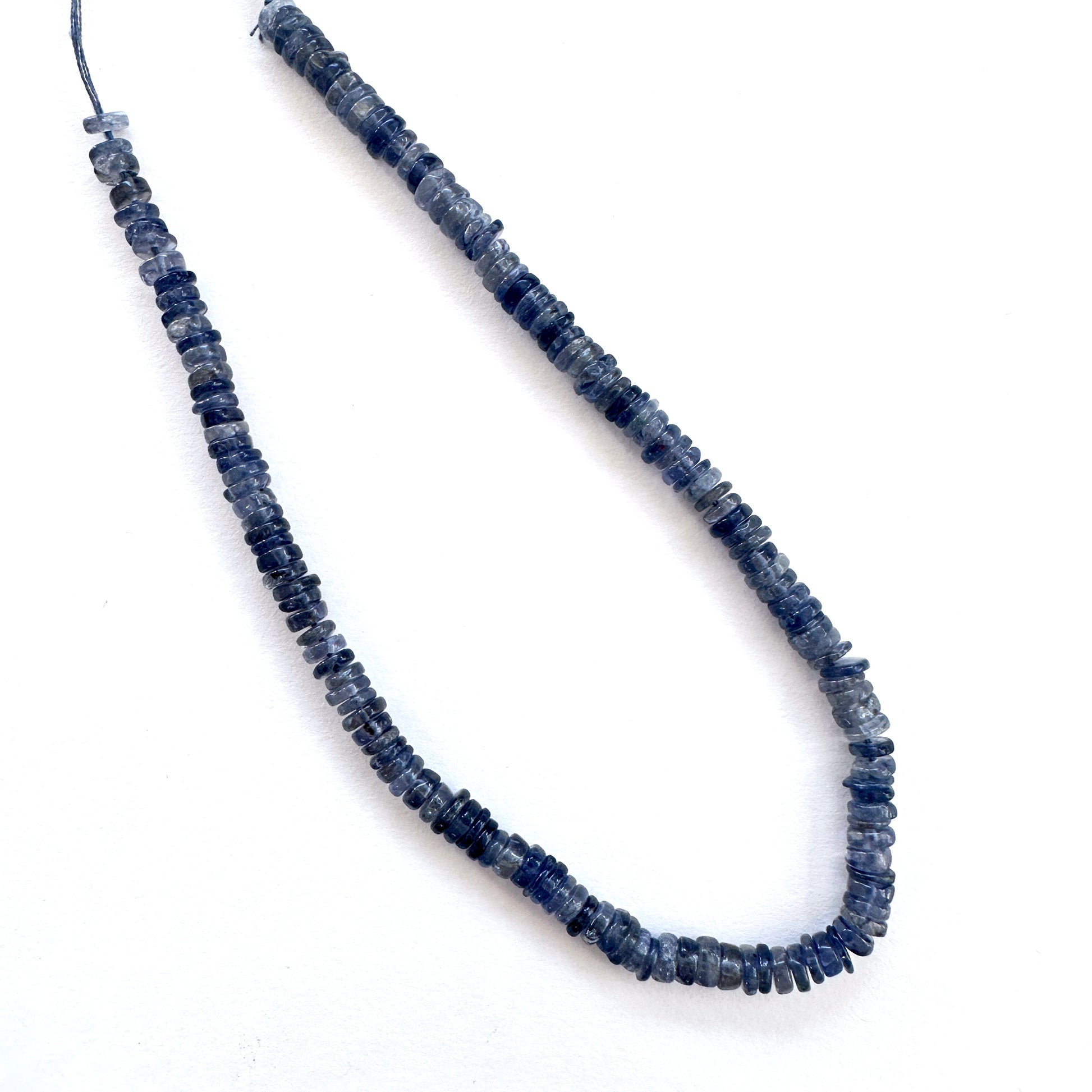 High-quality Tanzanite natural gemstone beads with lustrous surface and clarity.