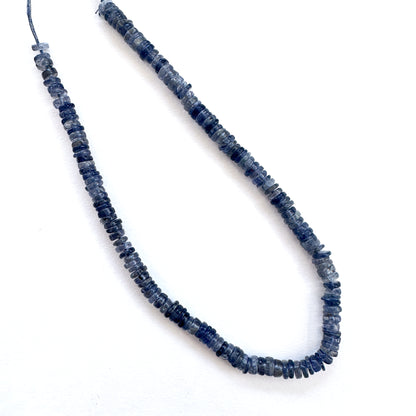 High-quality Tanzanite natural gemstone beads with lustrous surface and clarity.
