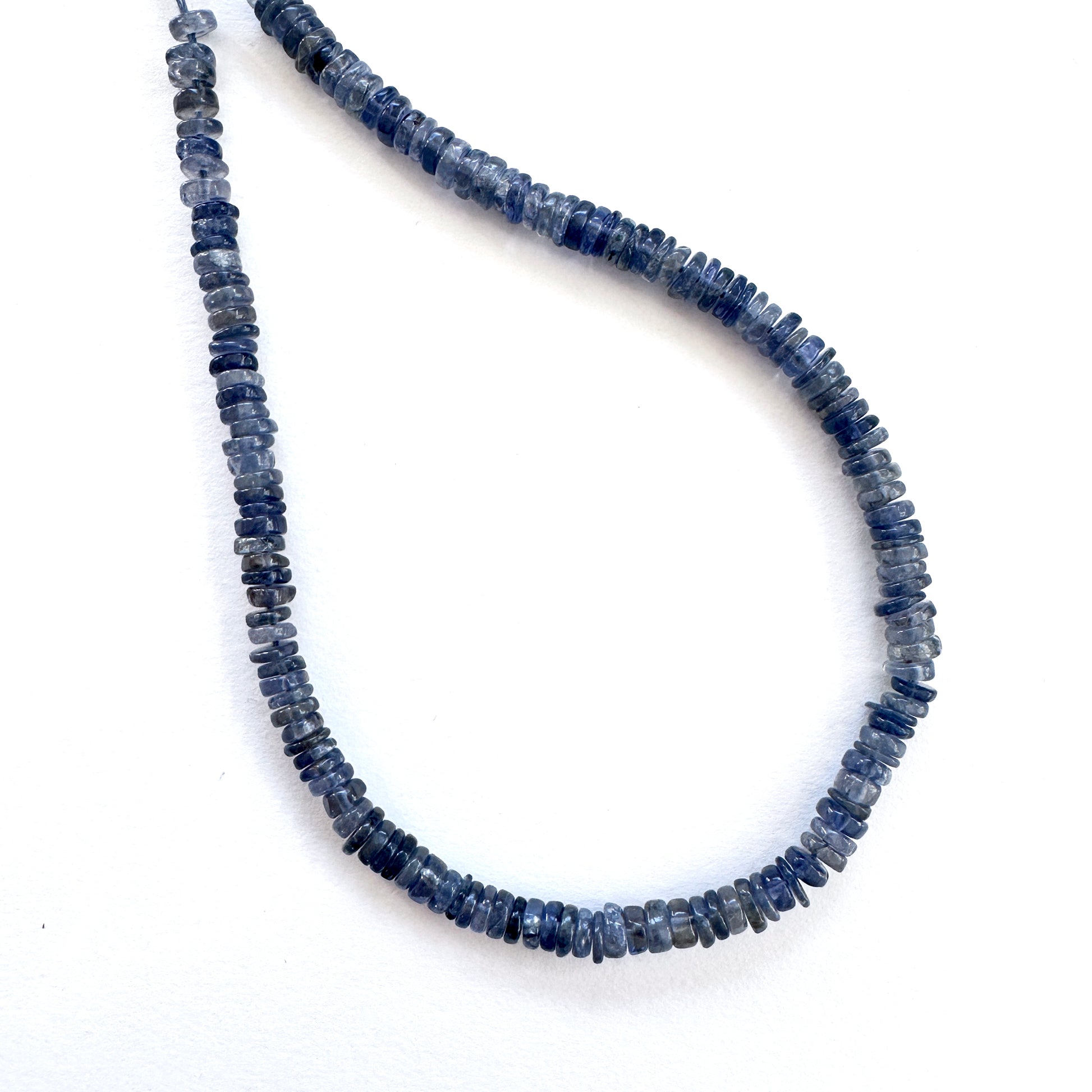 Handmade jewellery components featuring 4.1-4.3mm Tanzanite stone beads.
