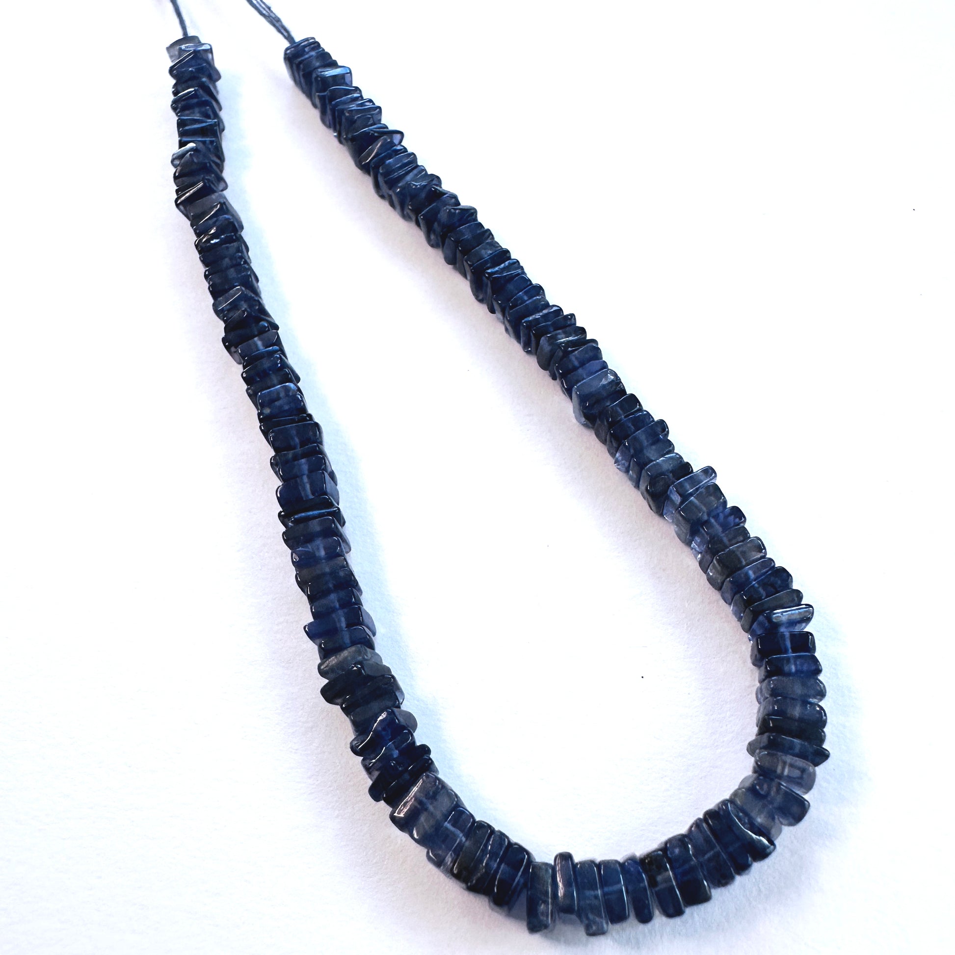 Handmade jewellery components featuring premium Tanzanite square heishi beads.