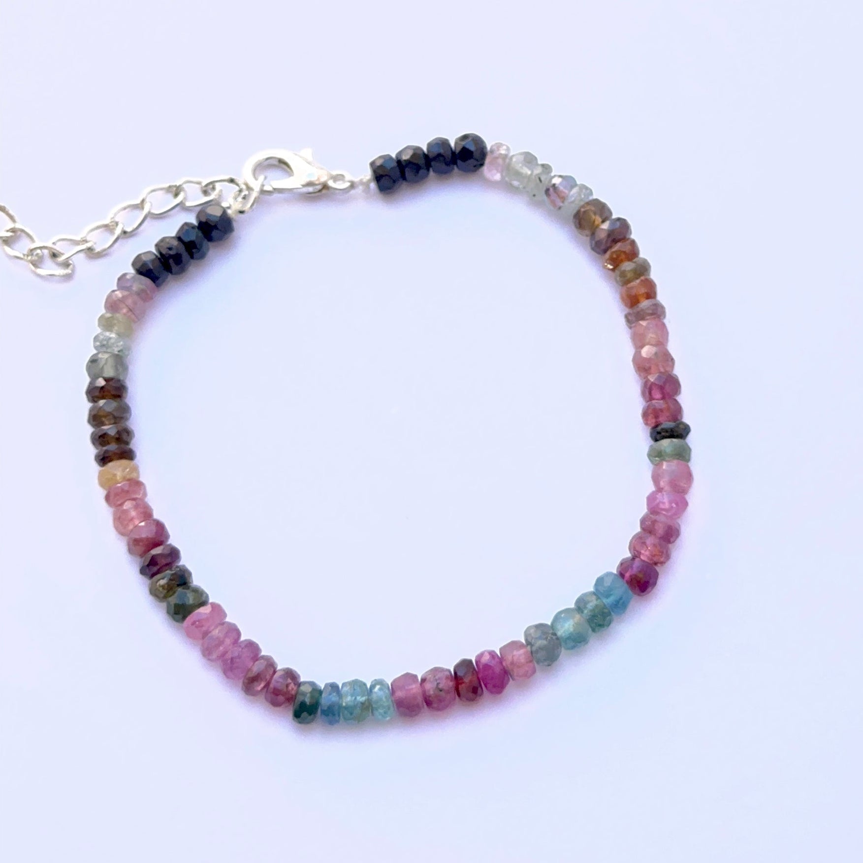 Elegant gemstone bracelet featuring faceted tourmaline beads in a refined layout.