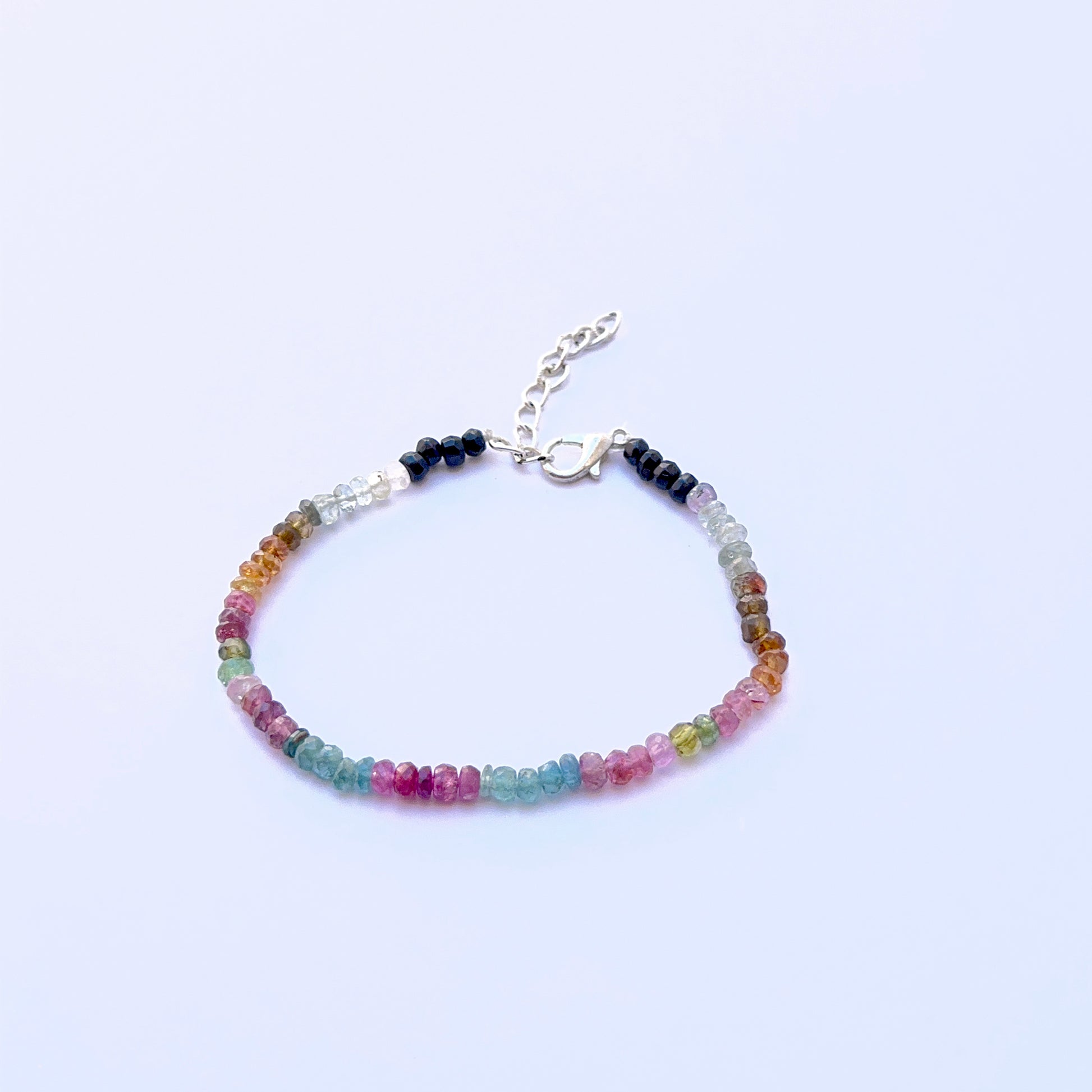 Tourmaline bracelet with sparkling rondelle beads showing natural colour variation.