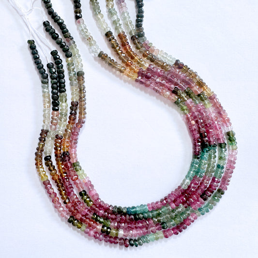 Faceted rondelle Tourmaline beads in 4.3-4.5mm size, featuring multicolour tones and brilliant sparkle across the strand.