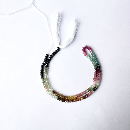 Tourmaline gemstone strand with faceted rondelle beads, 4mm size, ideal for DIY jewellery projects.