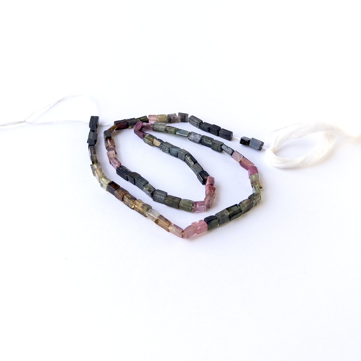 Authentic Tourmaline smooth rectangle beads with vibrant tones ideal for DIY jewellery making.