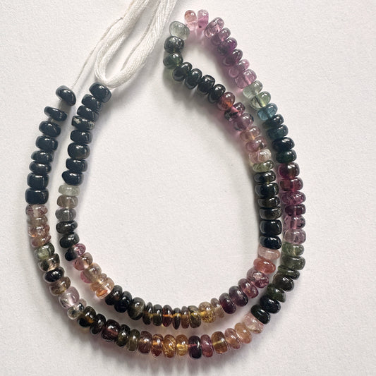 Tourmaline smooth rondelle beads in 5.5mm size arranged in a 37cm strand with polished finish and vibrant colour mix.