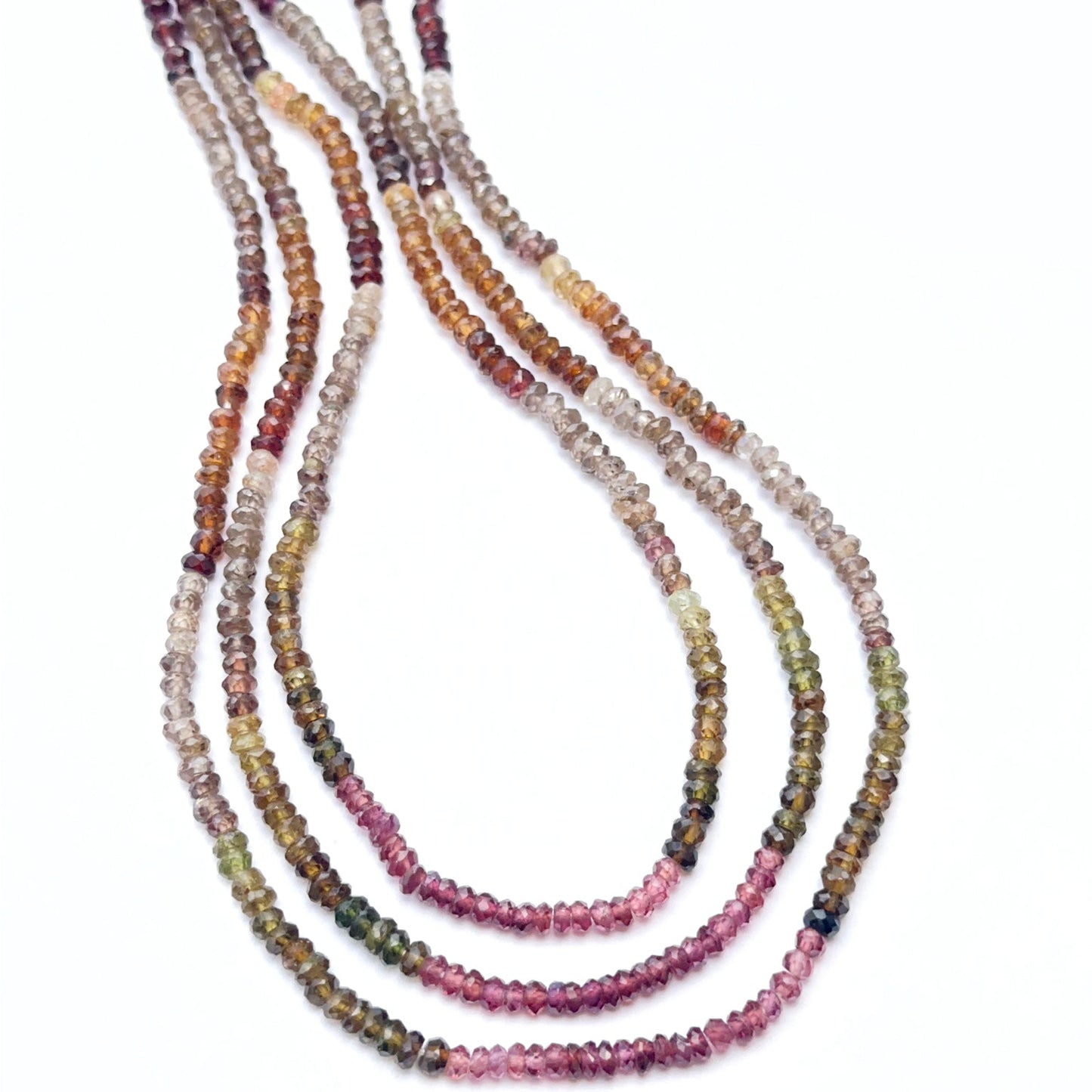 Tundra sapphire strand with faceted rondelles showing subtle sparkle and colour variation.