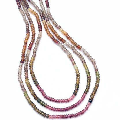 Tundra sapphire strand with faceted rondelles showing subtle sparkle and colour variation.