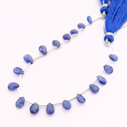 Top side drilled Blue Sapphire pear faceted almond beads 7–9mm, perfect for elegant drop earrings and pendant designs.
