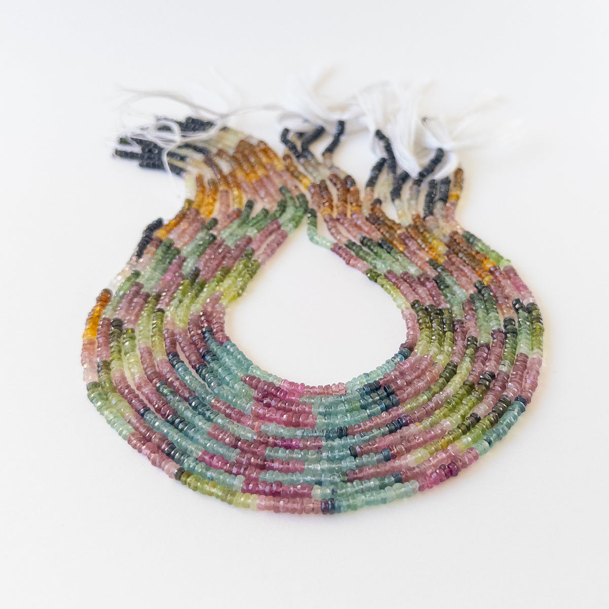 Genuine Watermelon Tourmaline stone beads with micro‑faceted sparkle and vibrant bi‑colour tones for handmade jewellery components.