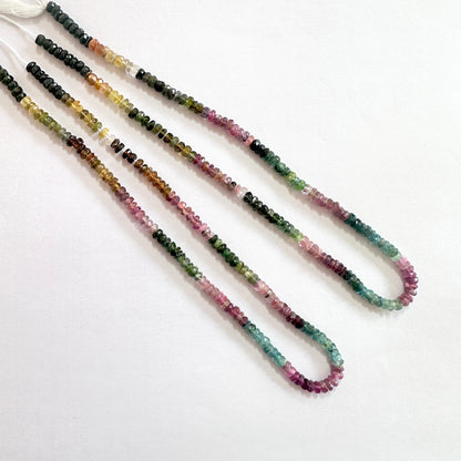 Multicolour Watermelon Tourmaline beads with faceted rondelle shape, reflecting light beautifully across the 34cm strand.