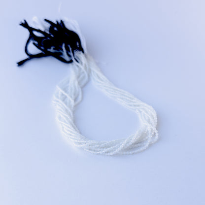 Natural White Chalcedony faceted rondelle stone beads 2.1mm displayed neatly for DIY jewellery and authentic gemstone designs.
