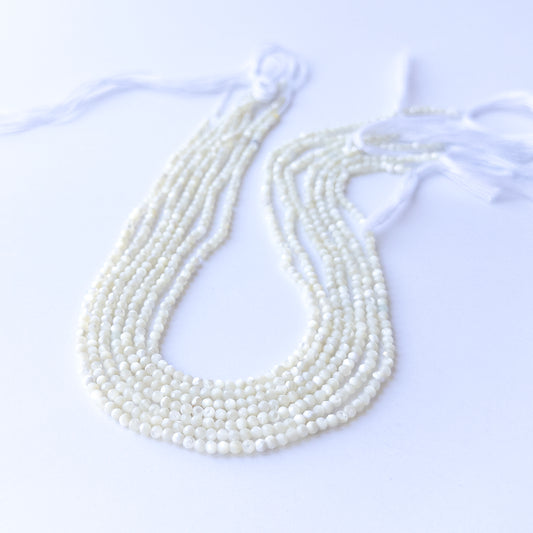 White Opal faceted rondelle beads in 3mm size on a 31cm strand, showcasing genuine gemstone sparkle for handmade jewellery.