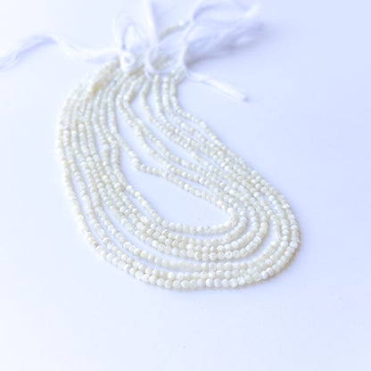 Authentic White Opal stone beads with faceted rondelle cut, ideal for DIY jewellery makers seeking premium gemstone components.