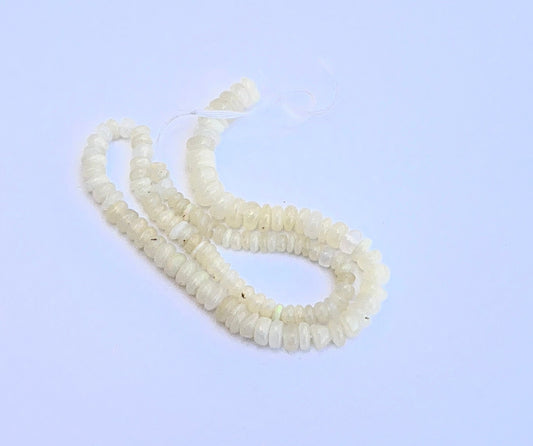 Natural white opal smooth rondelle beads with soft milky tones for DIY jewellery. 