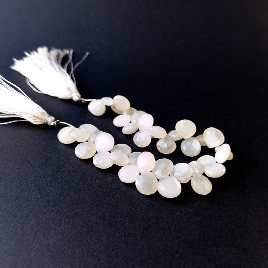 Genuine stone beads with soft white tones and rainbow flashes, featuring faceted briolettes for DIY jewellery making.