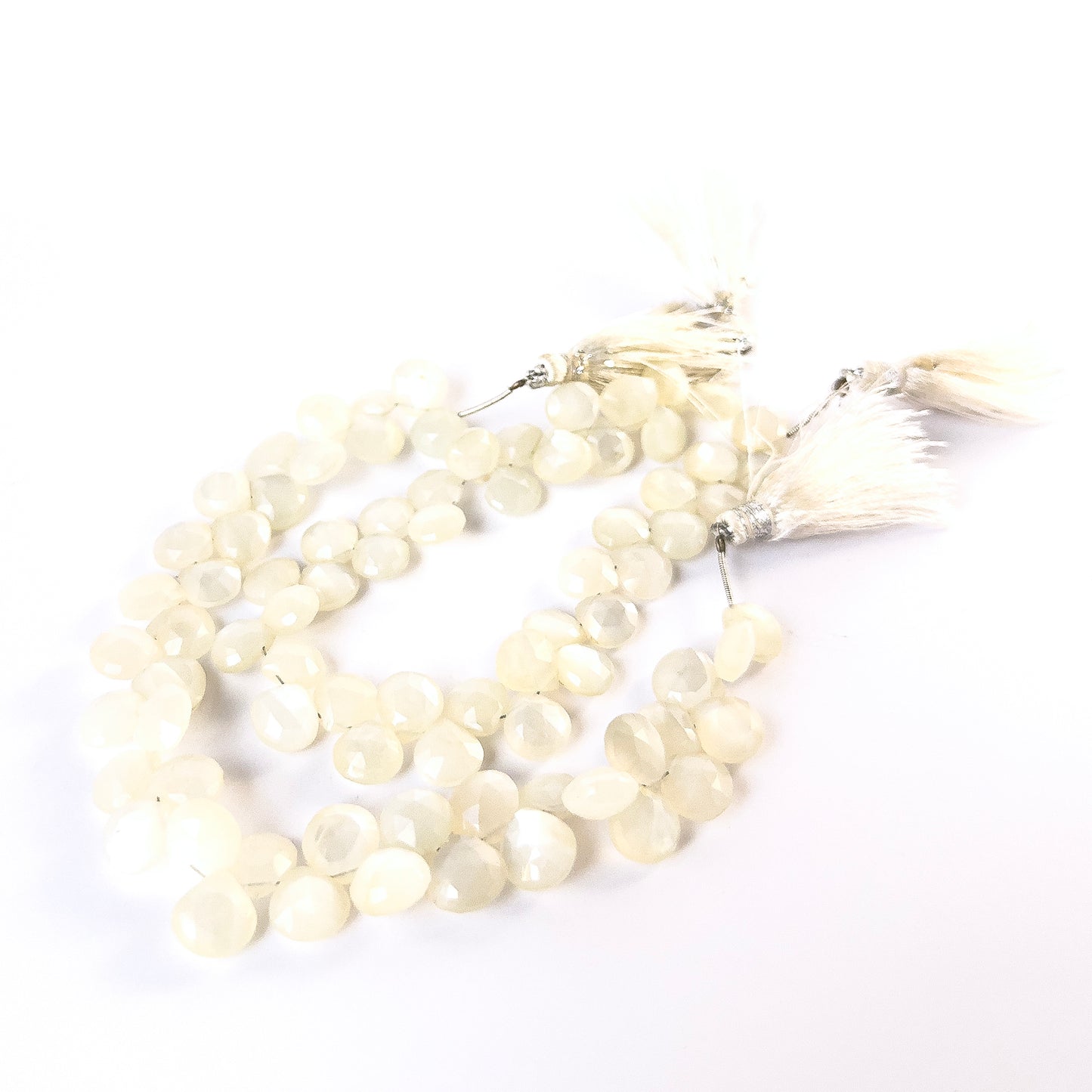 Genuine Moonstone faceted briolettes in 8.5–9mm and 9–9.5mm sizes, ideal for DIY gemstone jewellery making.