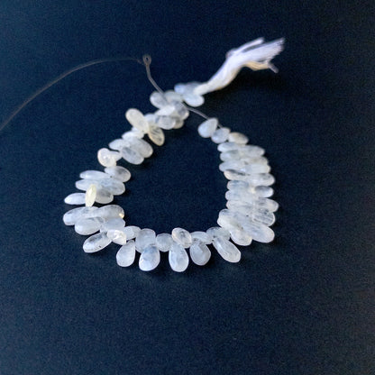Genuine Rainbow Moonstone stone beads in faceted pear briolette cut showcasing soft sheen and high‑quality sparkle.
