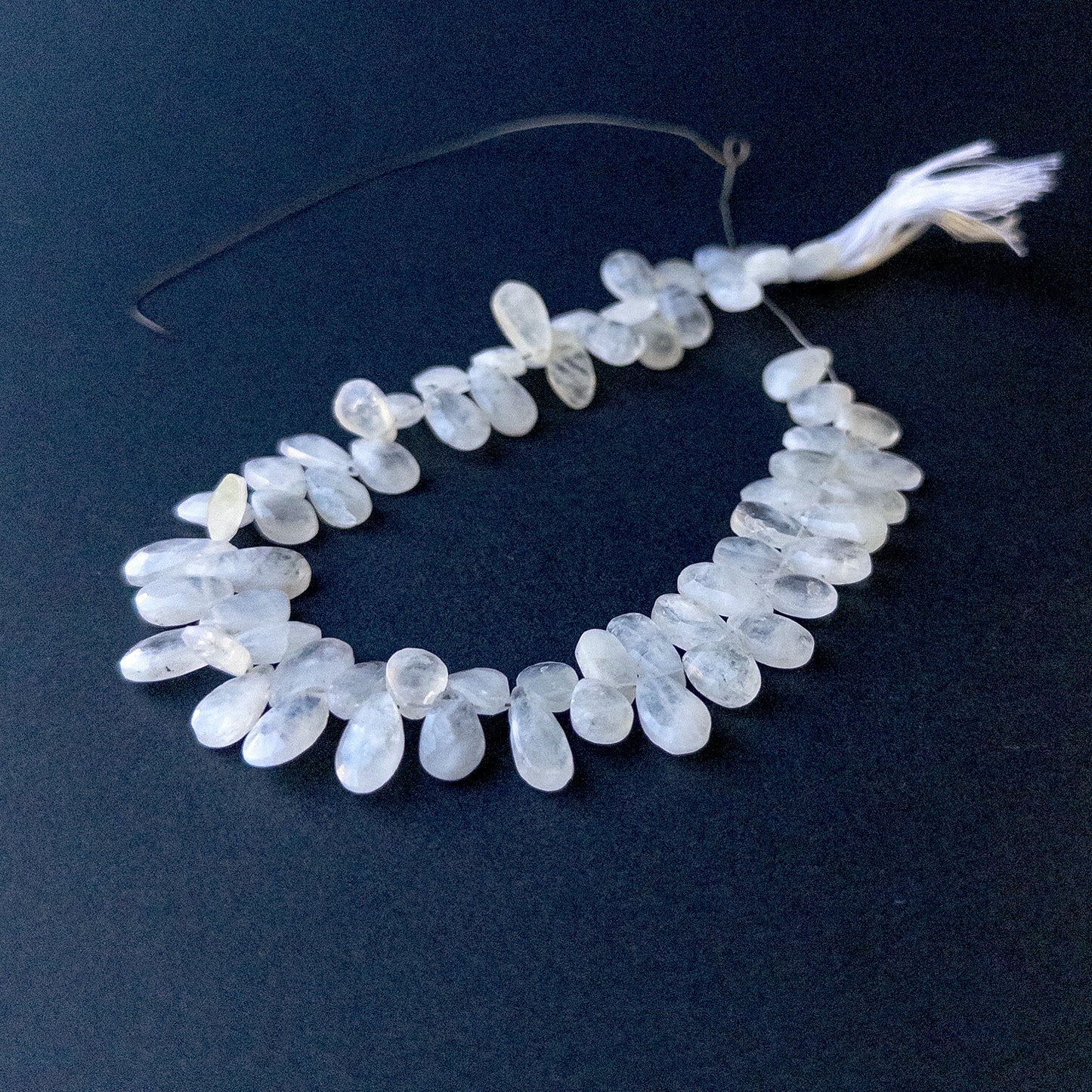 Authentic White Rainbow Moonstone faceted briolette beads with natural flash ideal for DIY jewellery making.