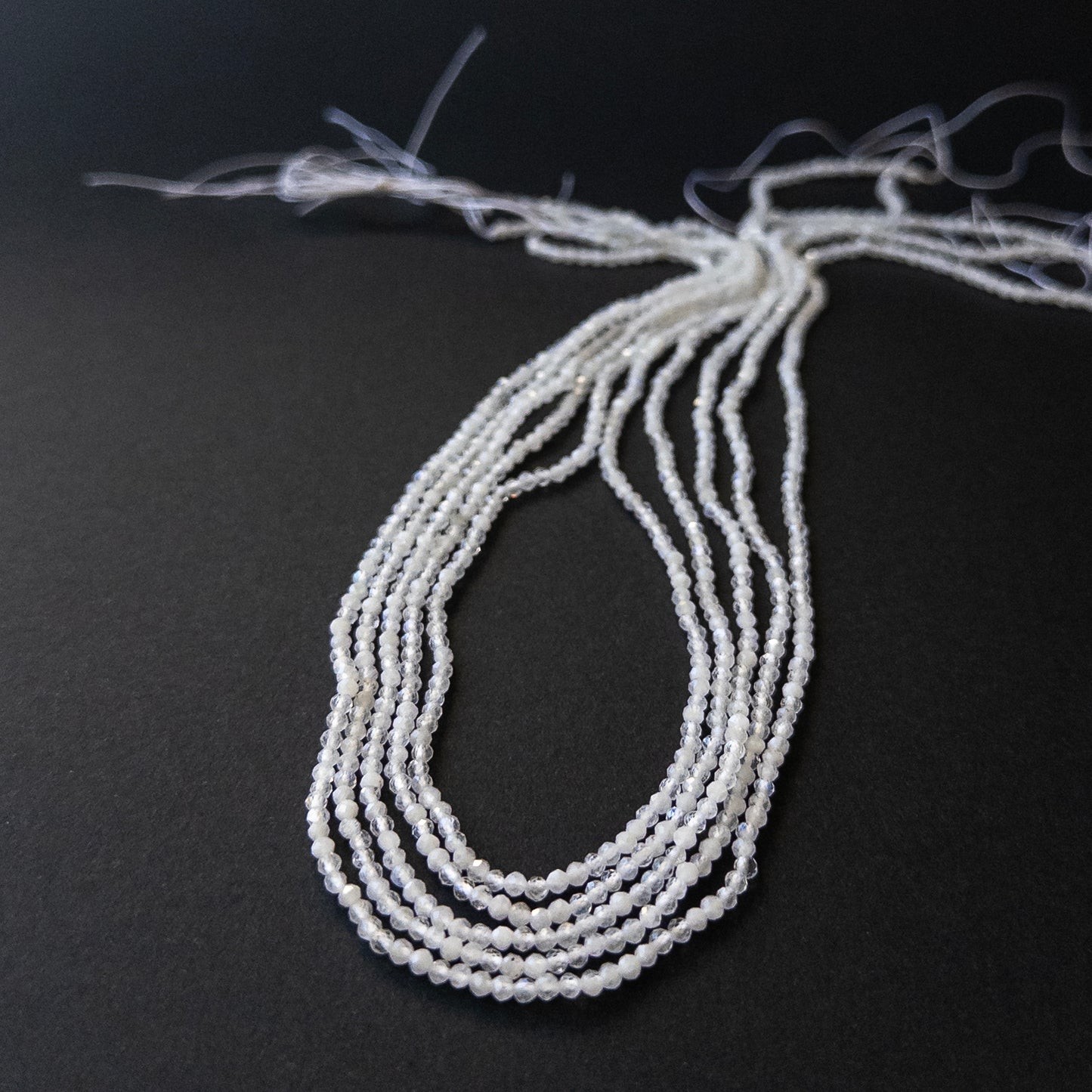 Premium White Rainbow Moonstone stone beads with fine faceting, ideal for elegant handmade jewellery.