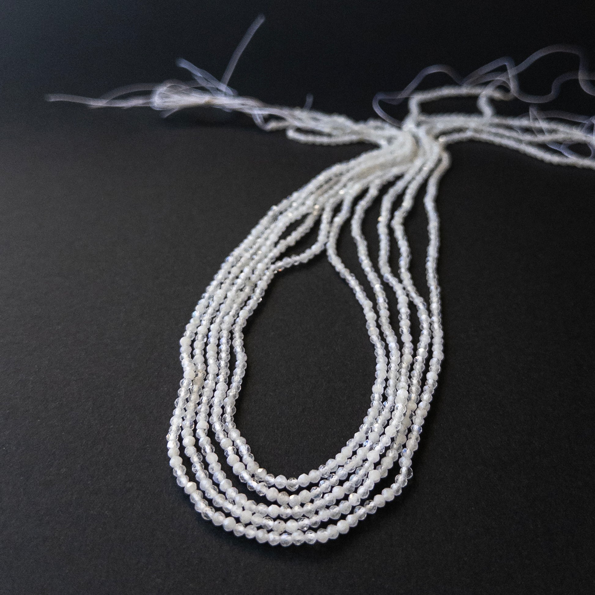 Premium White Rainbow Moonstone stone beads with fine faceting, ideal for elegant handmade jewellery.