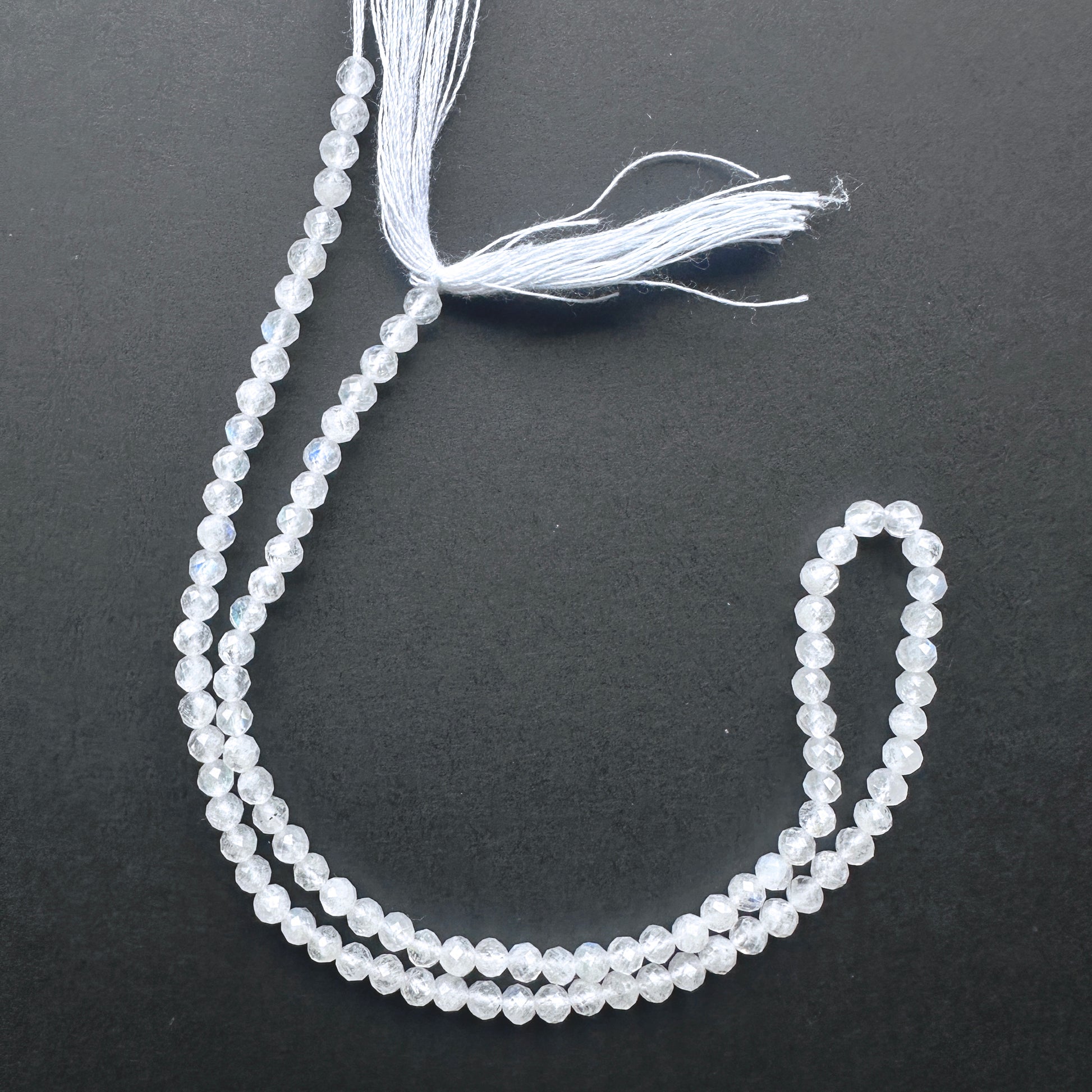 Natural gemstone beads in White Rainbow Moonstone with 3.3-3.4mm size and 0.4mm drilled holes.