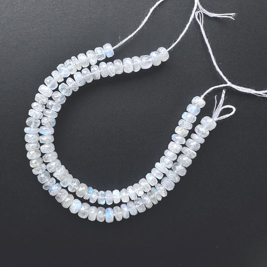 Natural gemstone beads featuring White Rainbow Moonstone with polished facets and consistent cut.