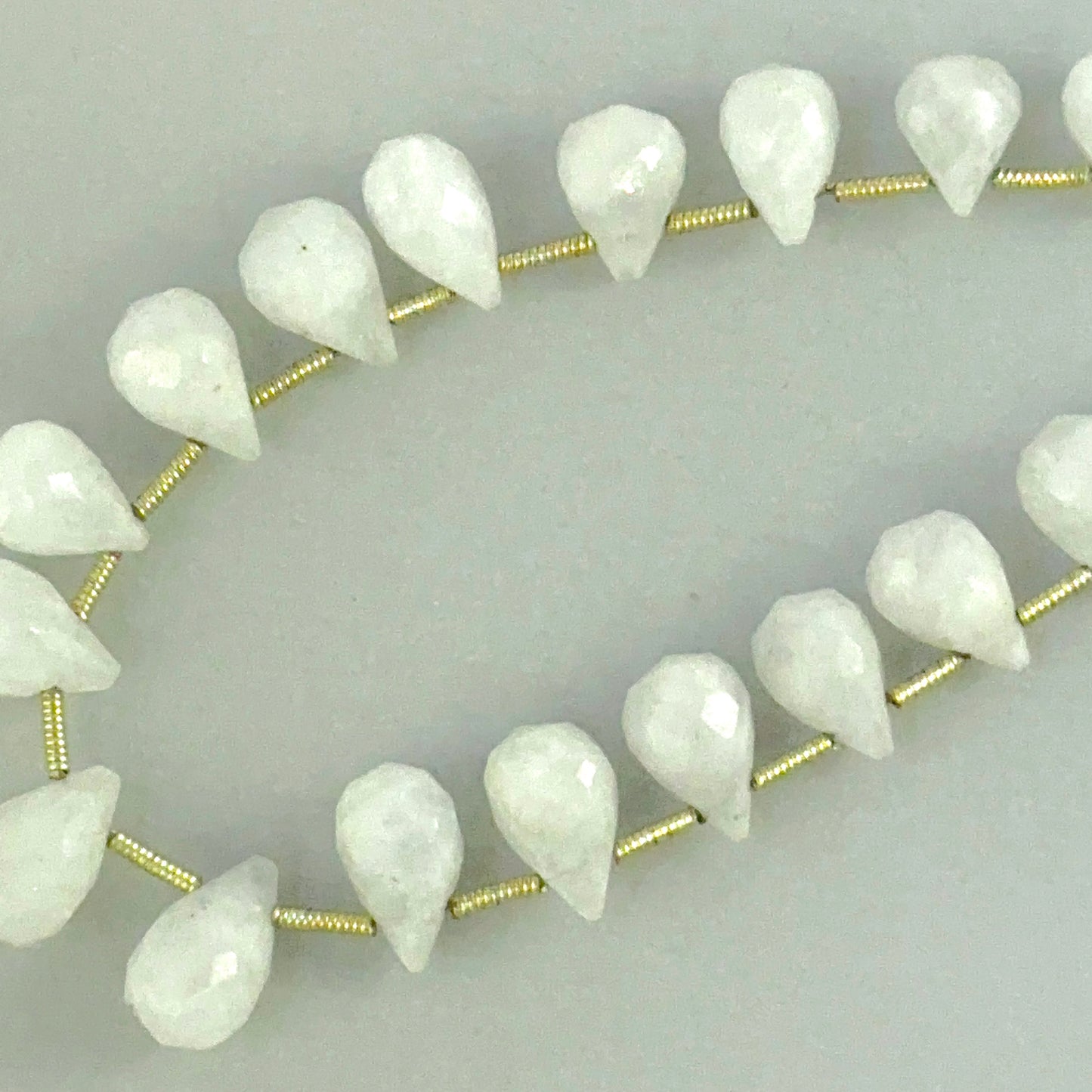 Hand‑selected Moonstone gemstone beads with crisp faceting and subtle rainbow sheen.