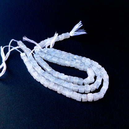 Authentic Moonstone gemstone beads showcasing smooth cube cuts ideal for handmade jewellery components.