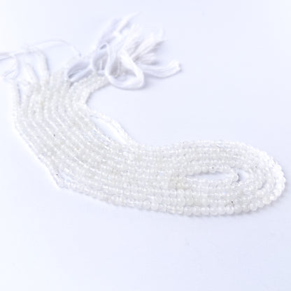 Genuine White Rainbow Moonstone stone beads for DIY jewellery featuring polished round shaping and luminous colour.