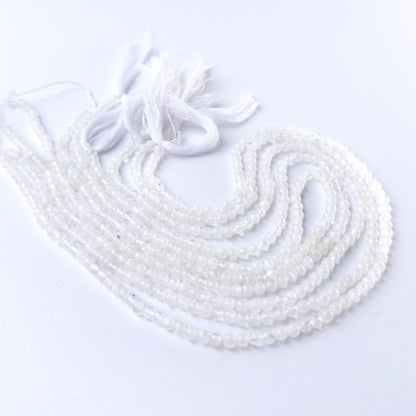 Authentic Moonstone gemstone beads showcasing smooth round cuts ideal for handmade jewellery components.